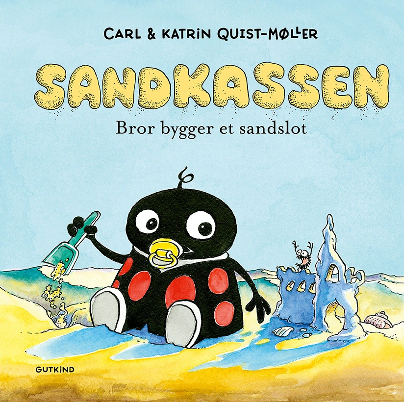 Billede af Sandkassen. Bror bygger et sandslot